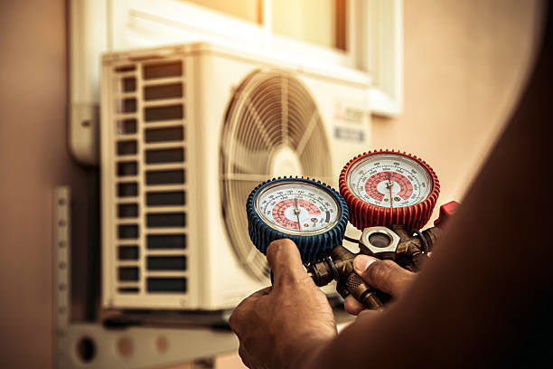 Professional Air Conditioning Service technician working in University Park, MD